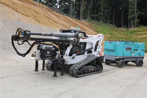 skid steer rock drill|word rock skid steer attachment.